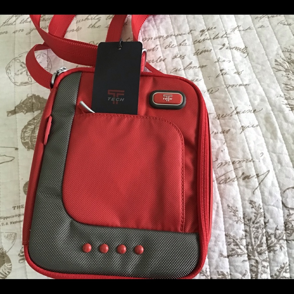 NWT.  TUMI CROSSBODY BAG